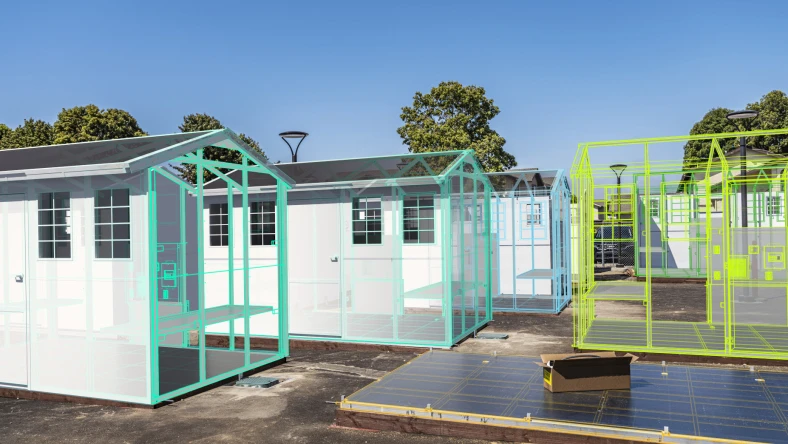 Image showing several small structures with brightly colored overlay designs