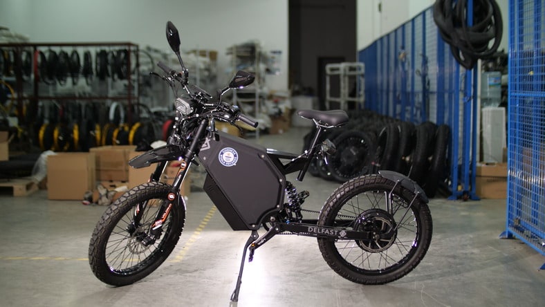 A bicycle inside a warehouse.