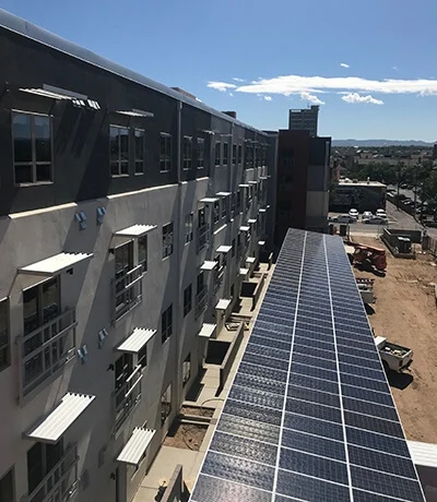 net zero buildings solar-powered water-heating system in carport