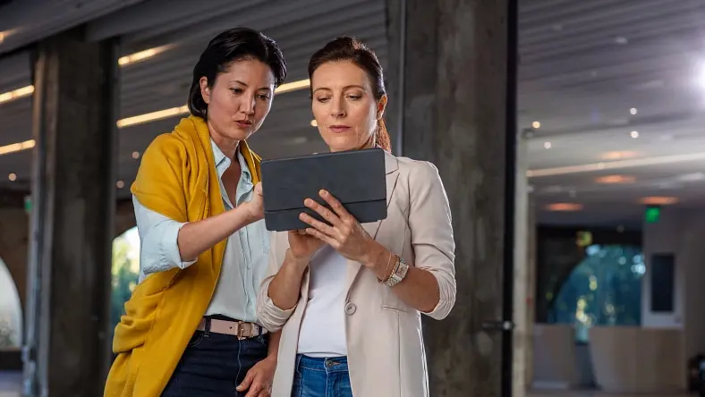 Water professionals looking at a tablet
