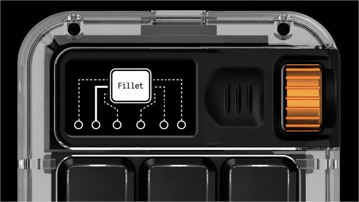 Autodesk (micro) Macro Keypad featuring the Fillet command on its display and an orange control dial