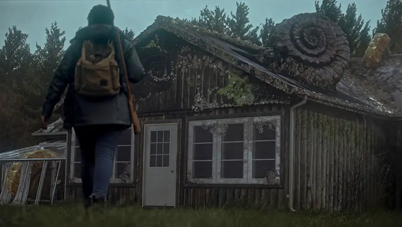 A man views an ominous building in a scene from the short film 'The Fore-Men'