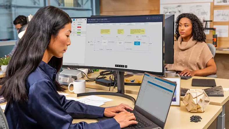 Designer working at a workstation in an office setting