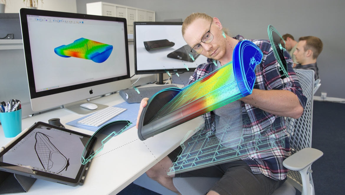 Man running simulation studies with Autodesk Fusion.