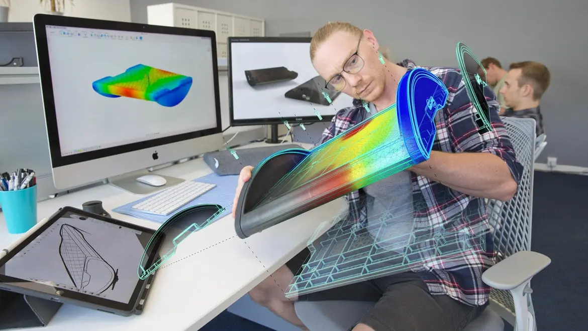 Man running simulation studies with Autodesk Fusion.