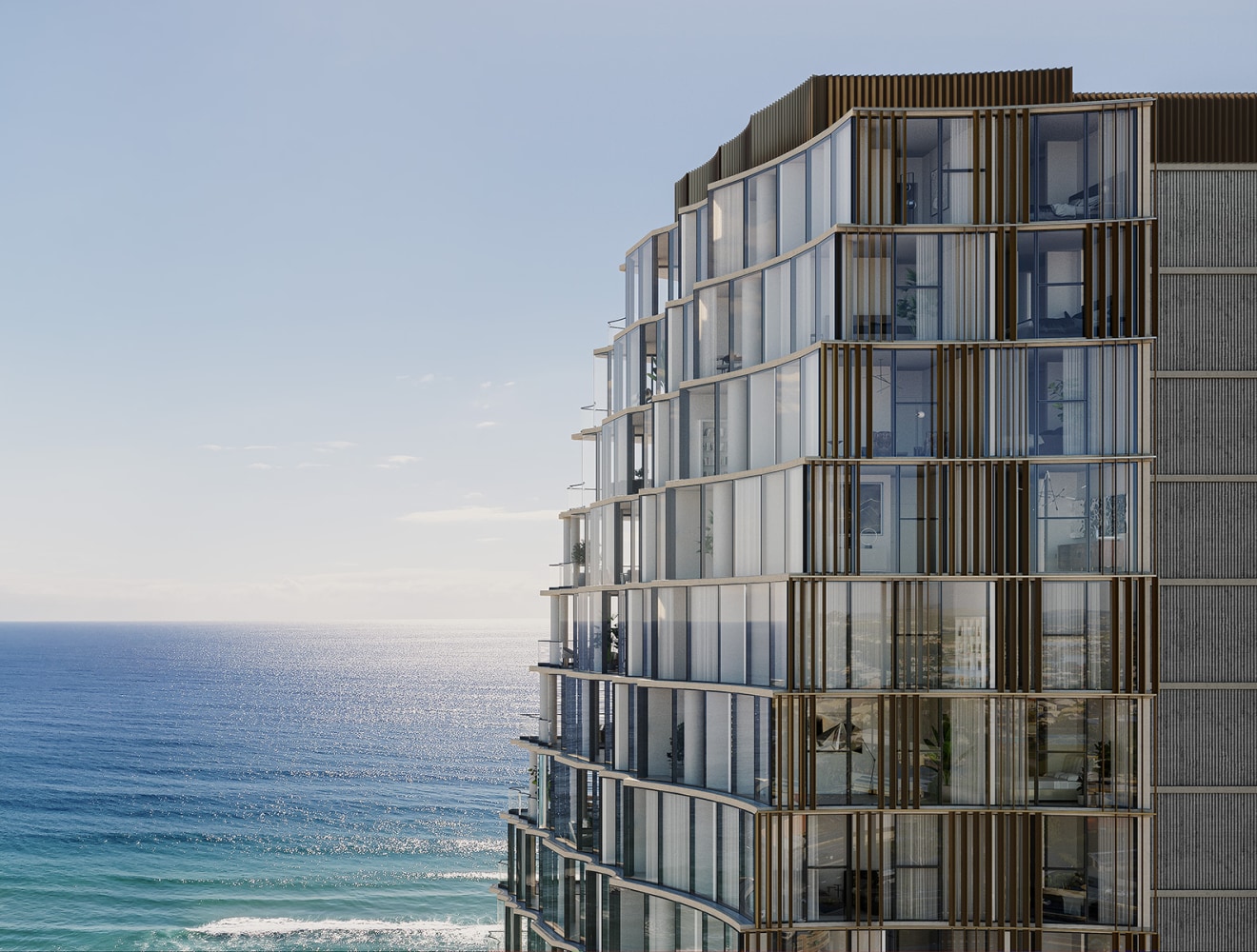 building with glass windows beside the ocean