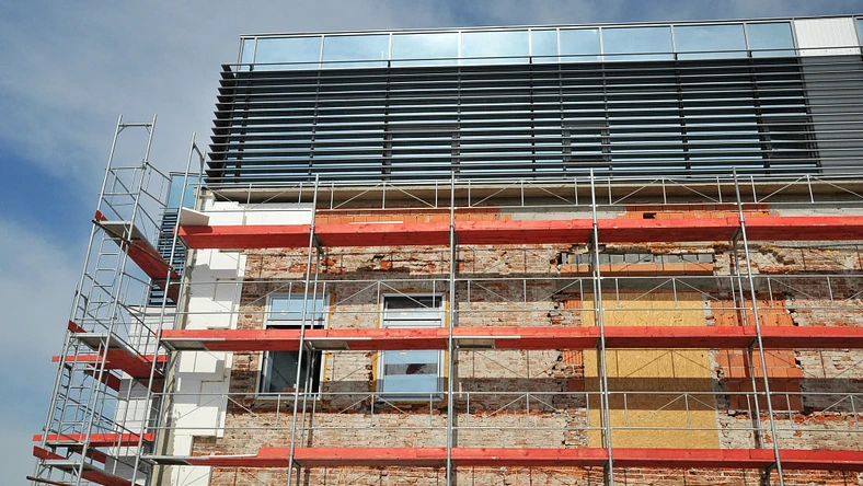 Exterior view of an existing building undergoing renovation