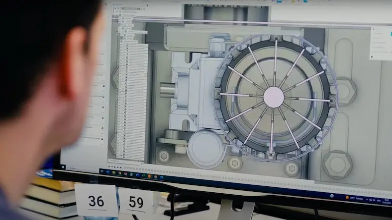 Close-up of a man viewing a screen in Fusion software.