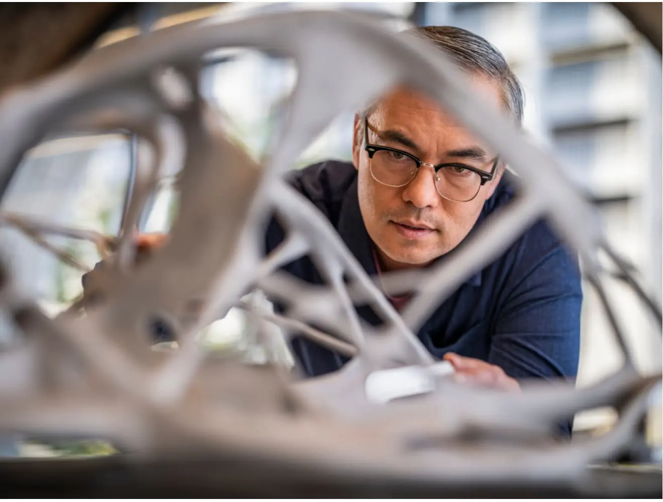 educator observes generative design object