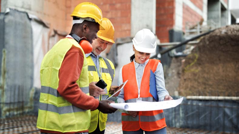 Civil Engineers looking at plans