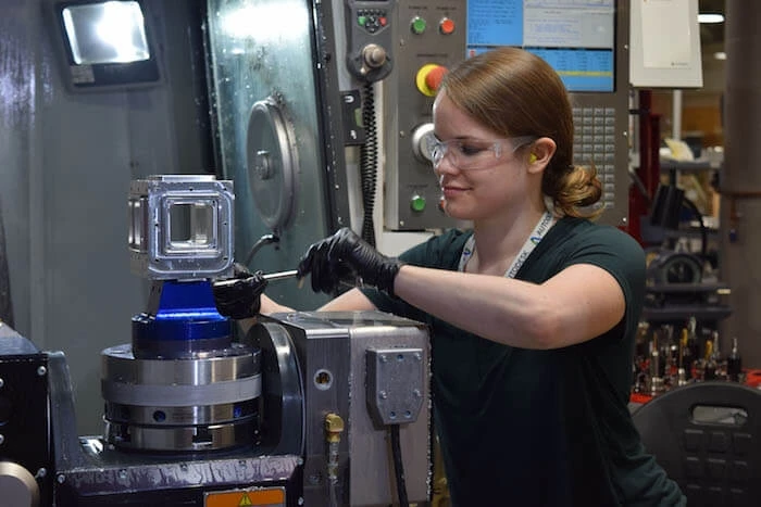 betsy jasper using a cnc milling machine