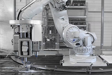 "Robots are saving manufacturing jobs. By making robots more Image