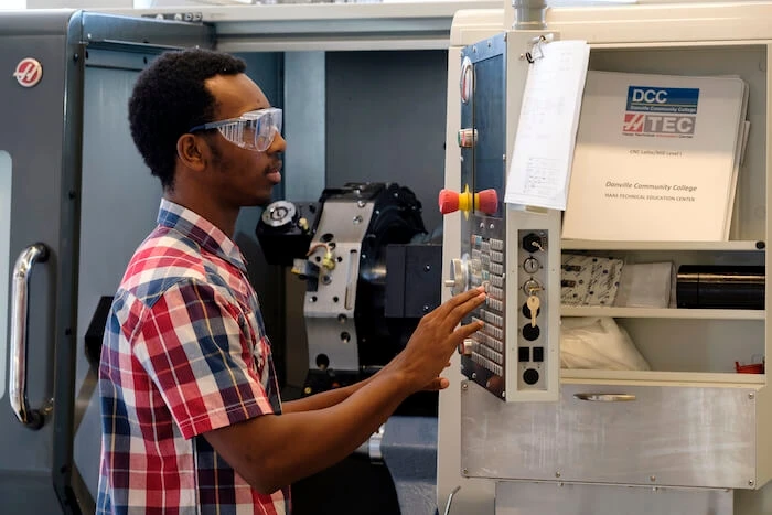 Advanced manufacturing training young man working in Gene Haas Center for Integrated Machining