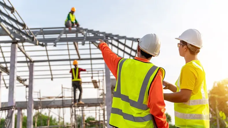 Construction team building a structure