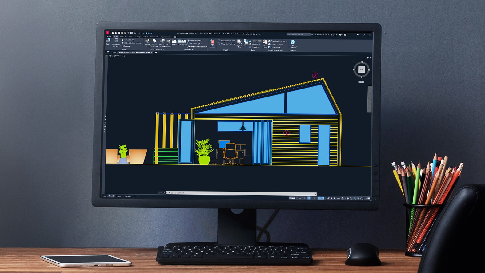 An AutoCAD LT design file on a desktop monitor