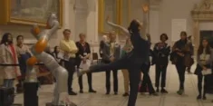 Woman dancing in gallery