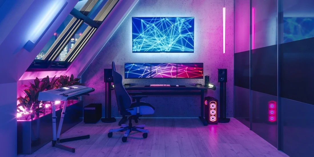 Interior of a gamer room lit with neon lights.