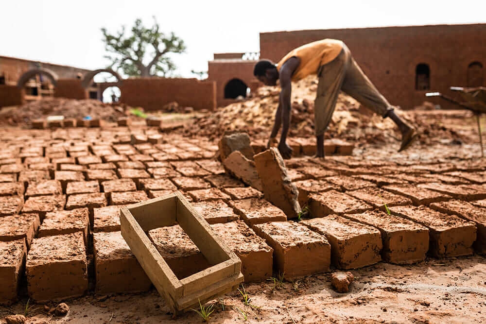 masons working on bricks for nubian vault