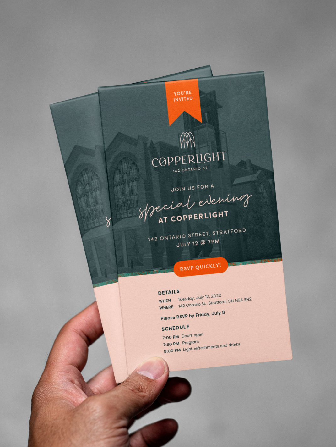 Hand holding copperlight pamphlet