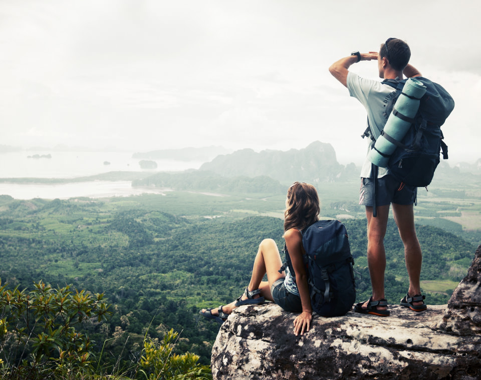 hiking-couple-taking-in-mountain-view-i-screen