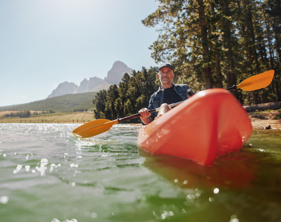 older-man-in-canoe-on-river-i-screen