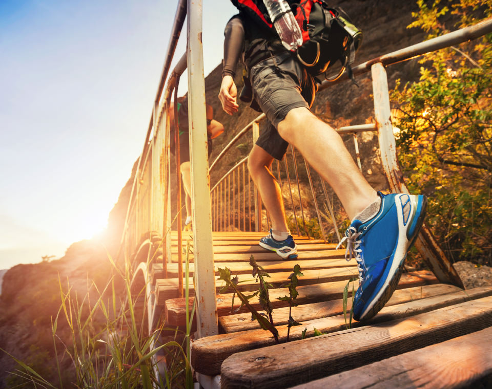 close-up-of-hiker-walking-up-wooden-steps-i-screen