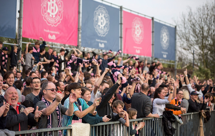 An image of Dulwich Hamlet fans celebrating a goal