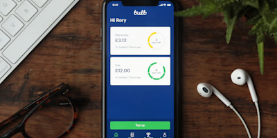 A photo of a phone showing the Bulb Smart Pay As You Go app