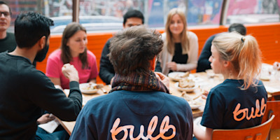A picture of Team Bulb members eating lunch together