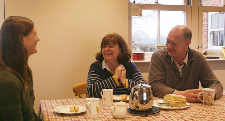 Clem from Team Bulb with Willie and Lynda, at home in their farmhouse