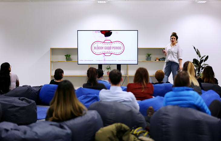 A picture of Gabby Edlin from Bloody Good Period presenting to Team Bulb