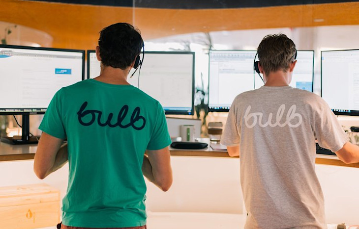 Bulb team members take phone calls.