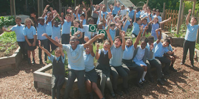 The children at St Mark's Primary School celebrate 100 Edible Playgrounds