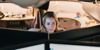A Bulb team member answers a call.