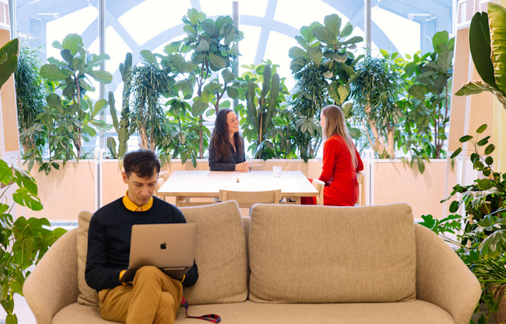 Team members chatting at Bulb's office.