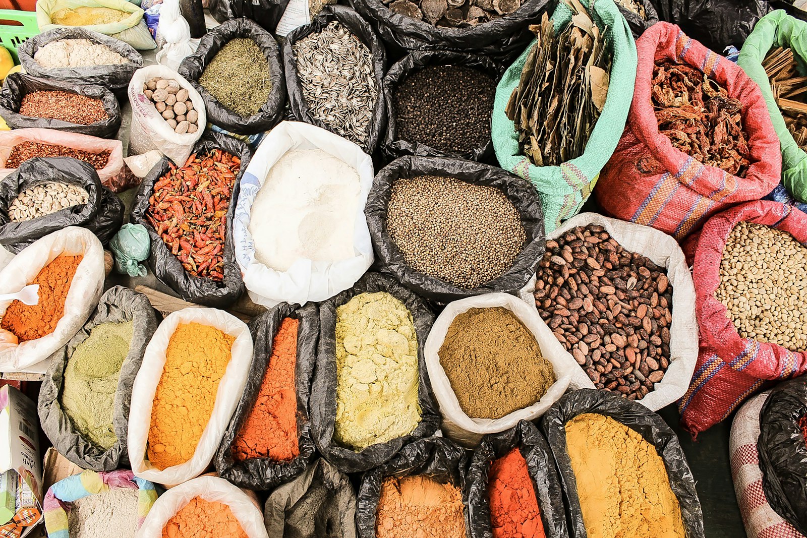 Sacks of spices, seeds and dried goods at a market