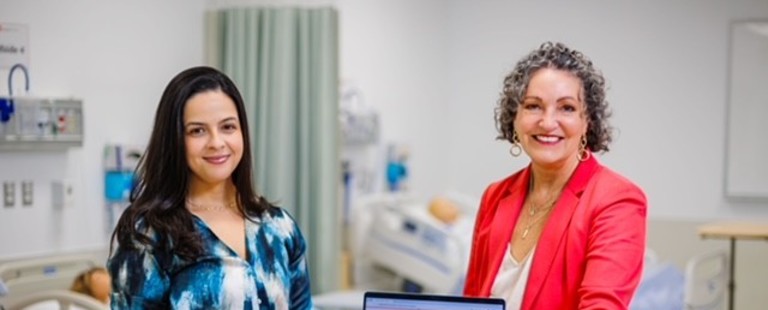 Ellyn Winters-Robison and Dr. Silva at Brock University’s nursing education lab.