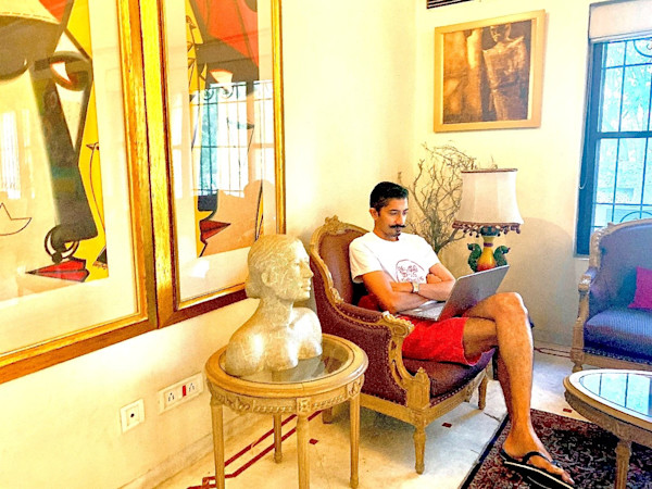 Jay sitting on his laptop