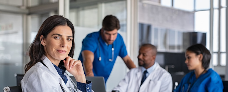 Female doctor working with team