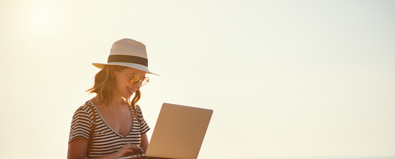 Woman working on a beach