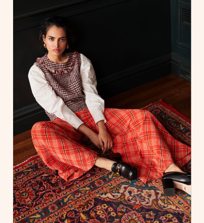 Plaid on plaid look with a sophisticated silhouette.