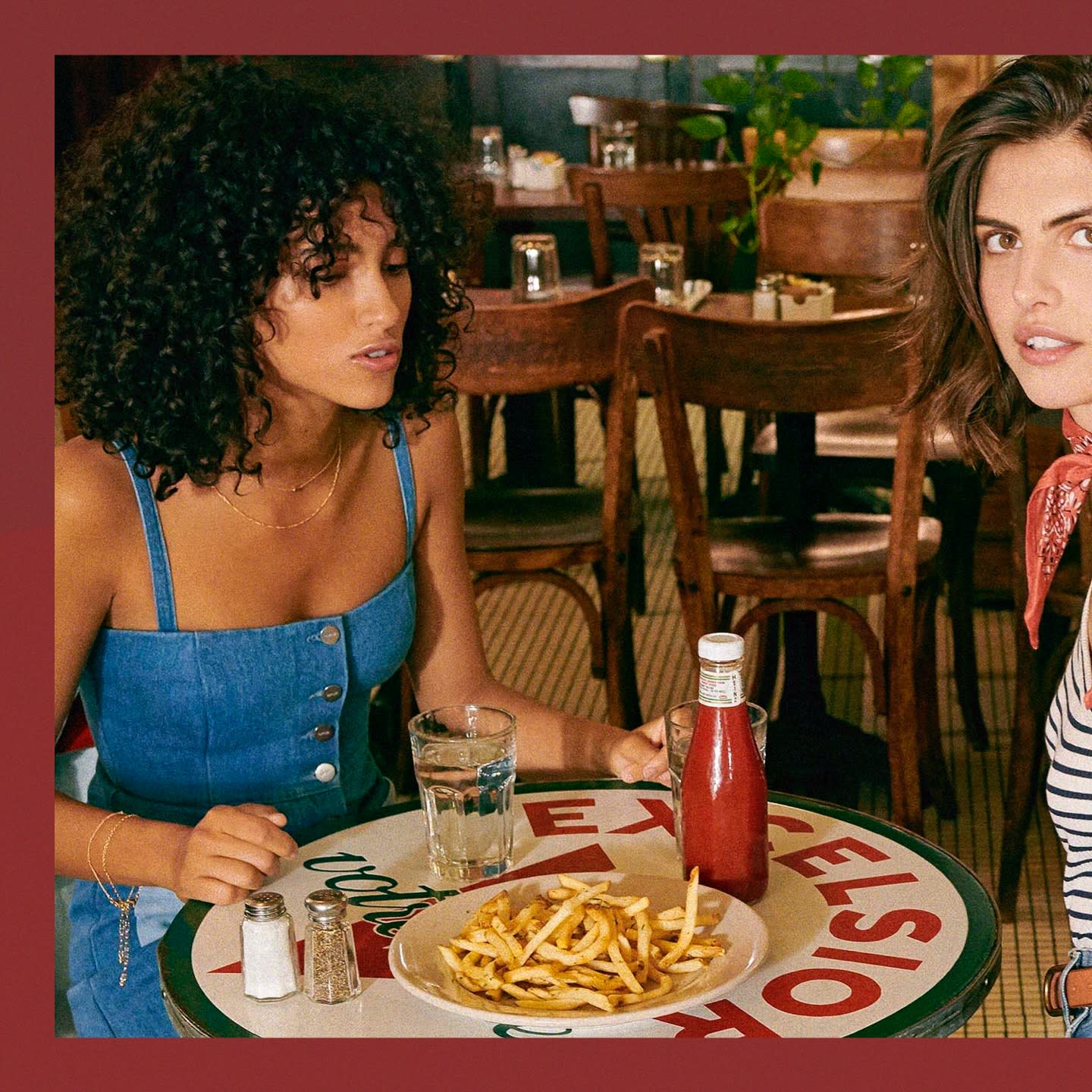 two models in a bar with denim outfits.
