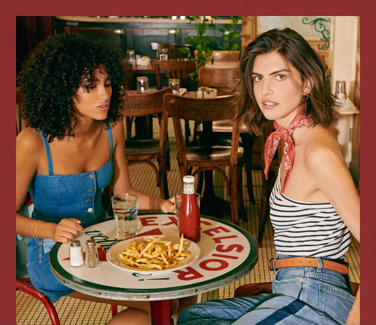 two models in a bar with denim outfits.