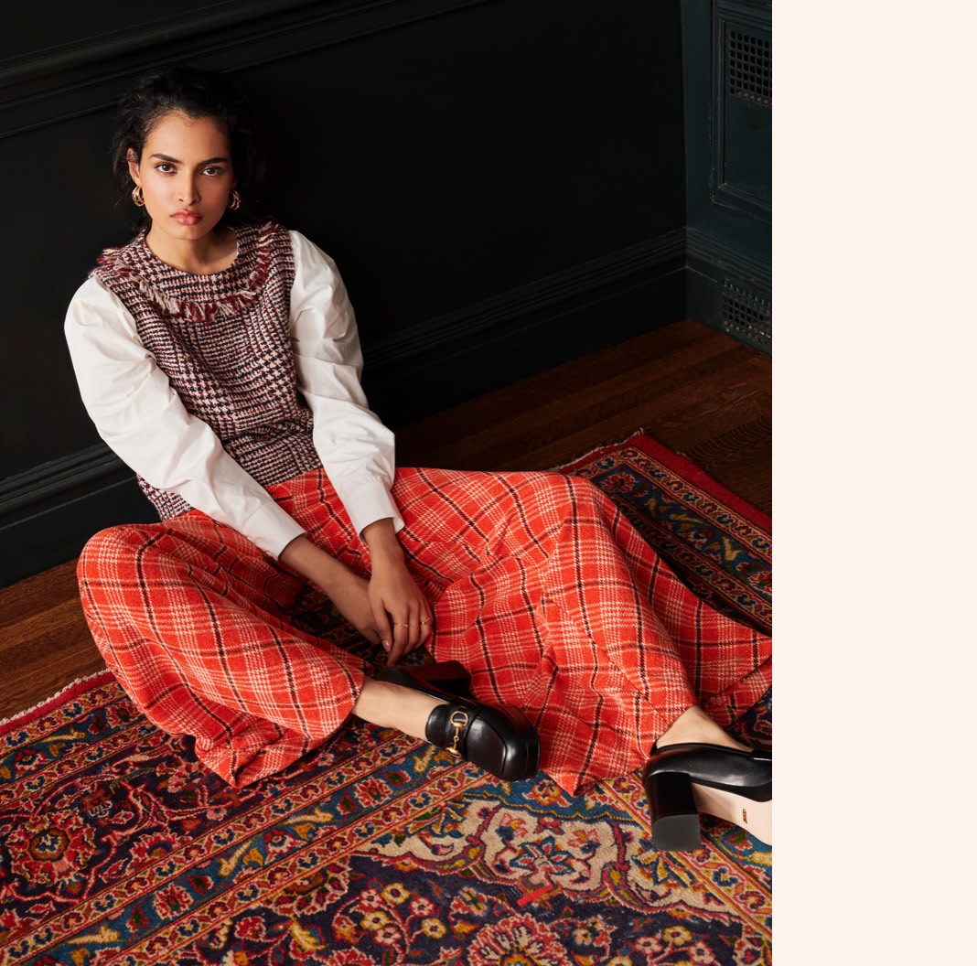 Plaid on plaid look with a sophisticated silhouette.