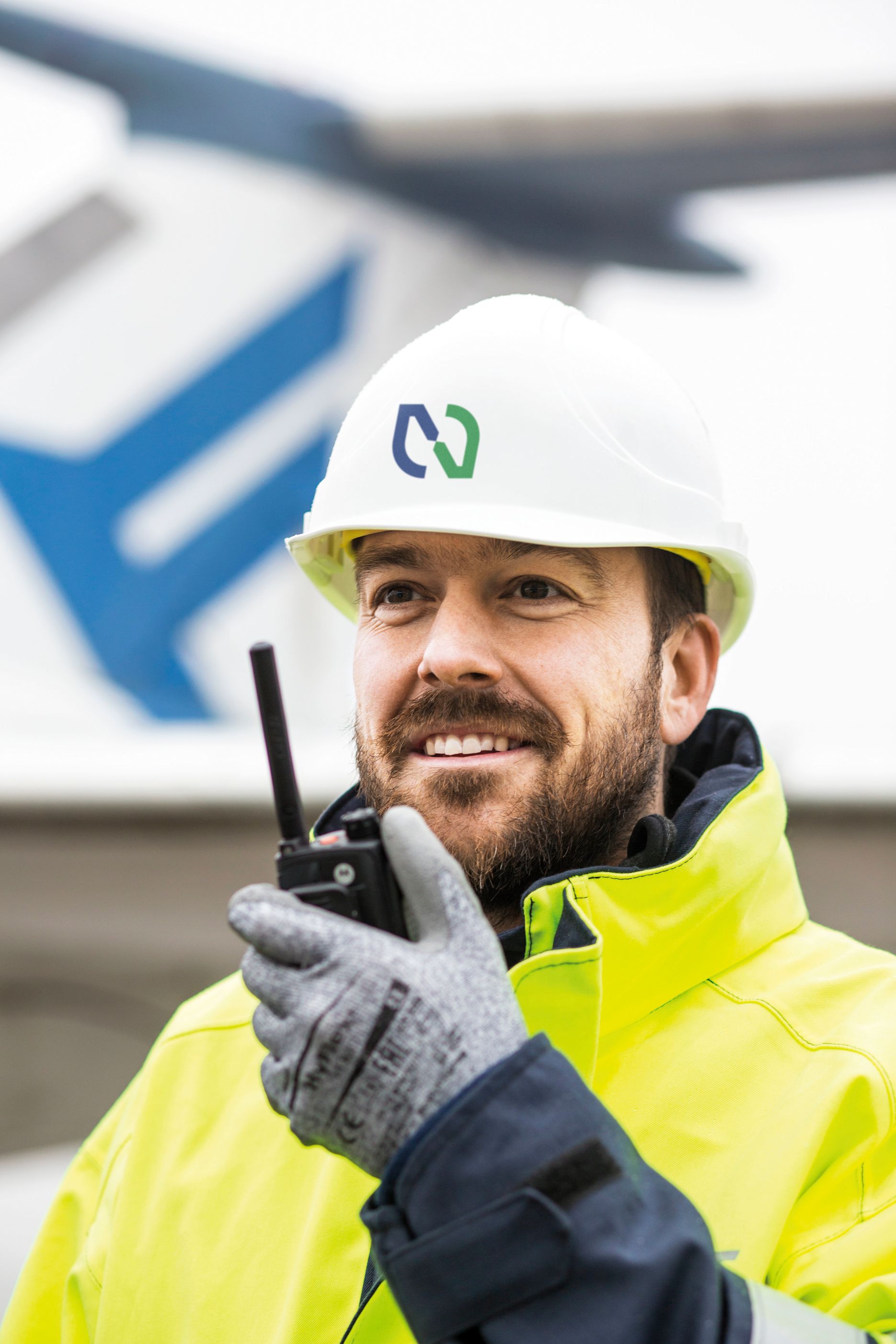 NDT Global employee with walkie talkie