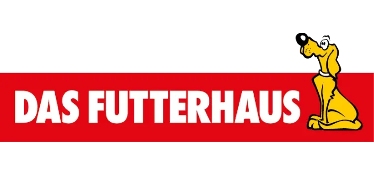 Logo von Das Futterhaus auf rotem Hintergrund, mit weißem, fettgedrucktem Text und einer Cartoon-Illustration eines gelben Hundes, der auf der rechten Seite sitzt, nach oben schaut und lächelt.