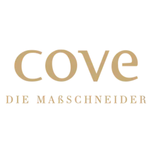 Logo mit dem Wort cove in beigefarbenen Kleinbuchstaben und dem Schriftzug DIE MANSCHIEFER in kleineren beigefarbenen Großbuchstaben darunter. Der Hintergrund ist transparent.