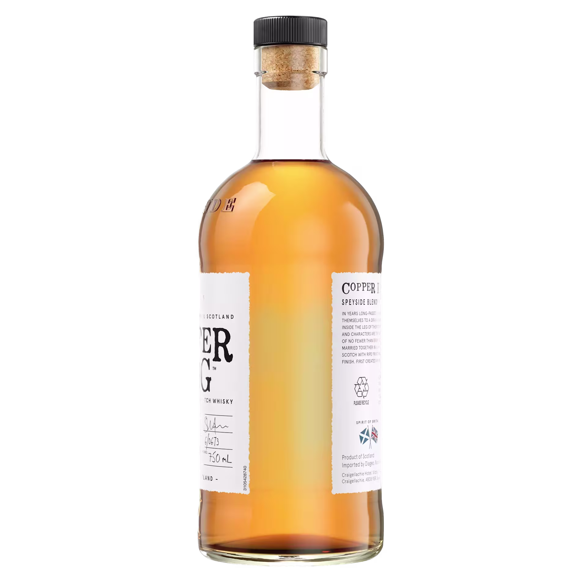 A clear glass bottle of amber-colored liquor with a cork stopper and white label, shown against a plain black background.