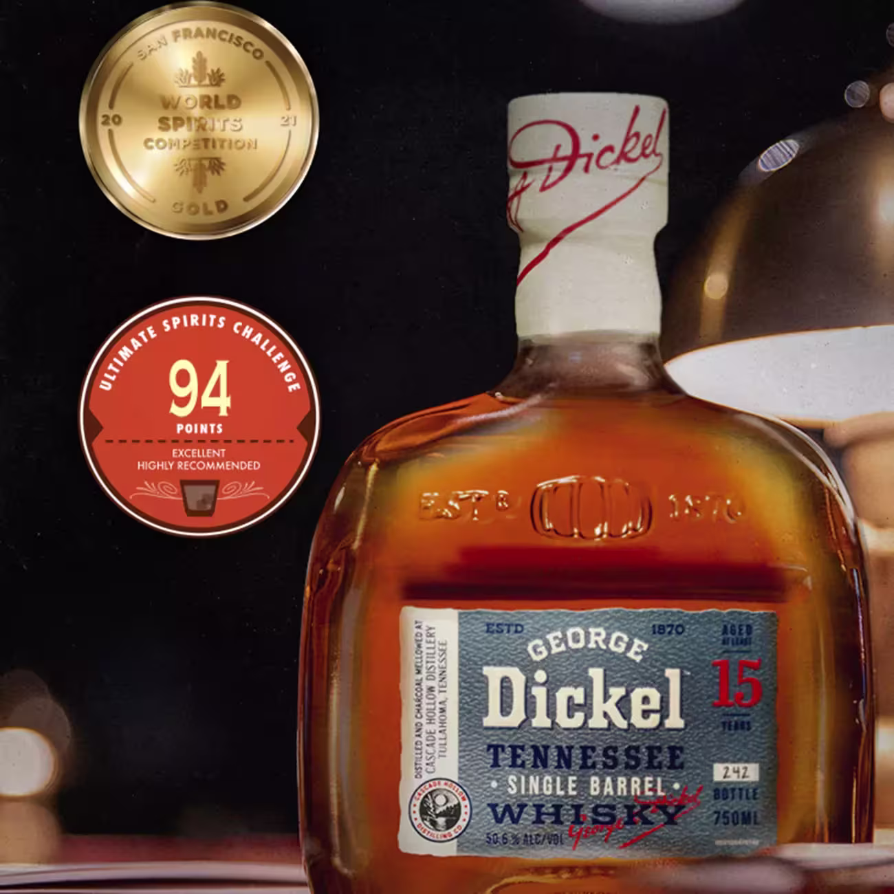 A bottle of George Dickel 15-Year Tennessee Single Barrel Whisky with gold and red award medals displayed beside it, highlighting its accolades.