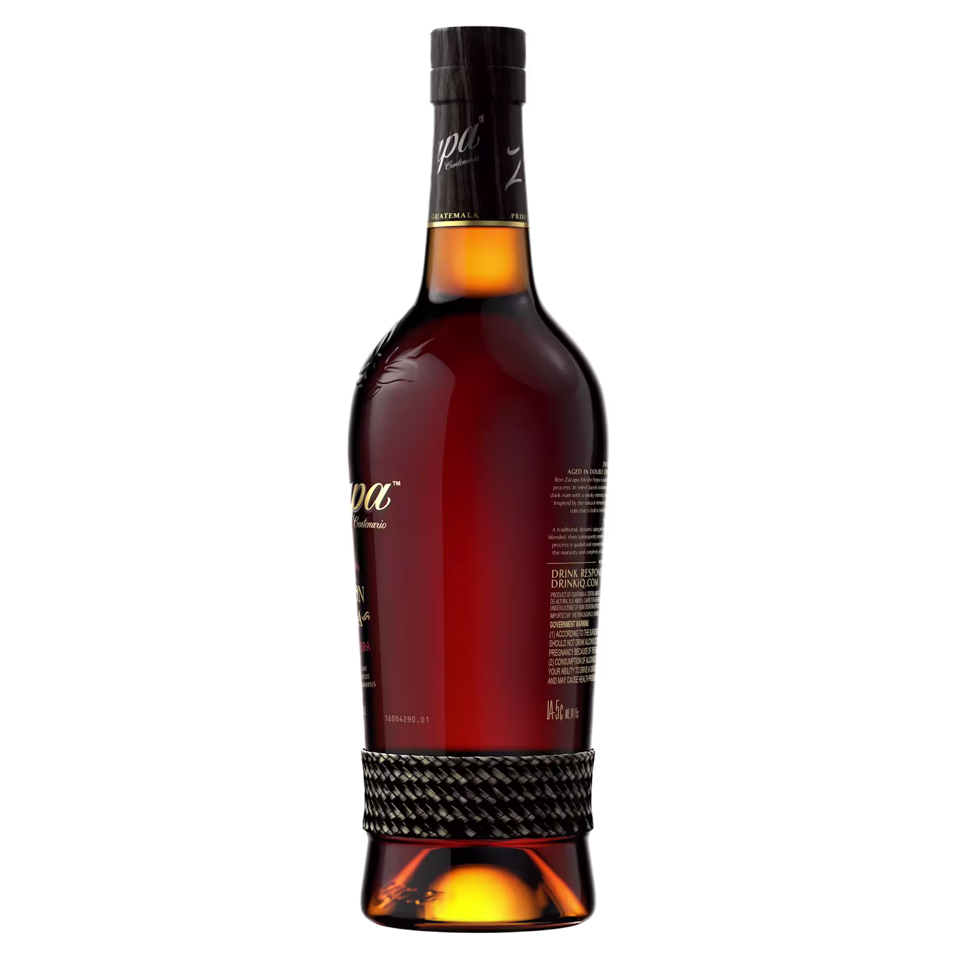 A dark glass bottle of rum with a black and gold label, featuring a braided detail around the lower part, displayed against a black background.